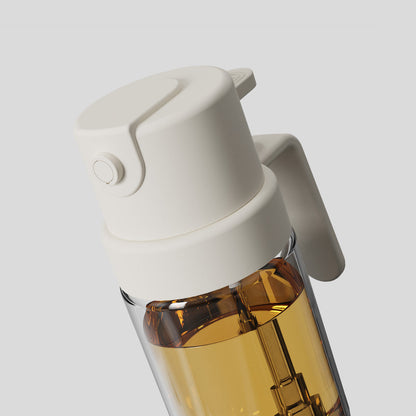 Flacon pulvérisateur d'huile